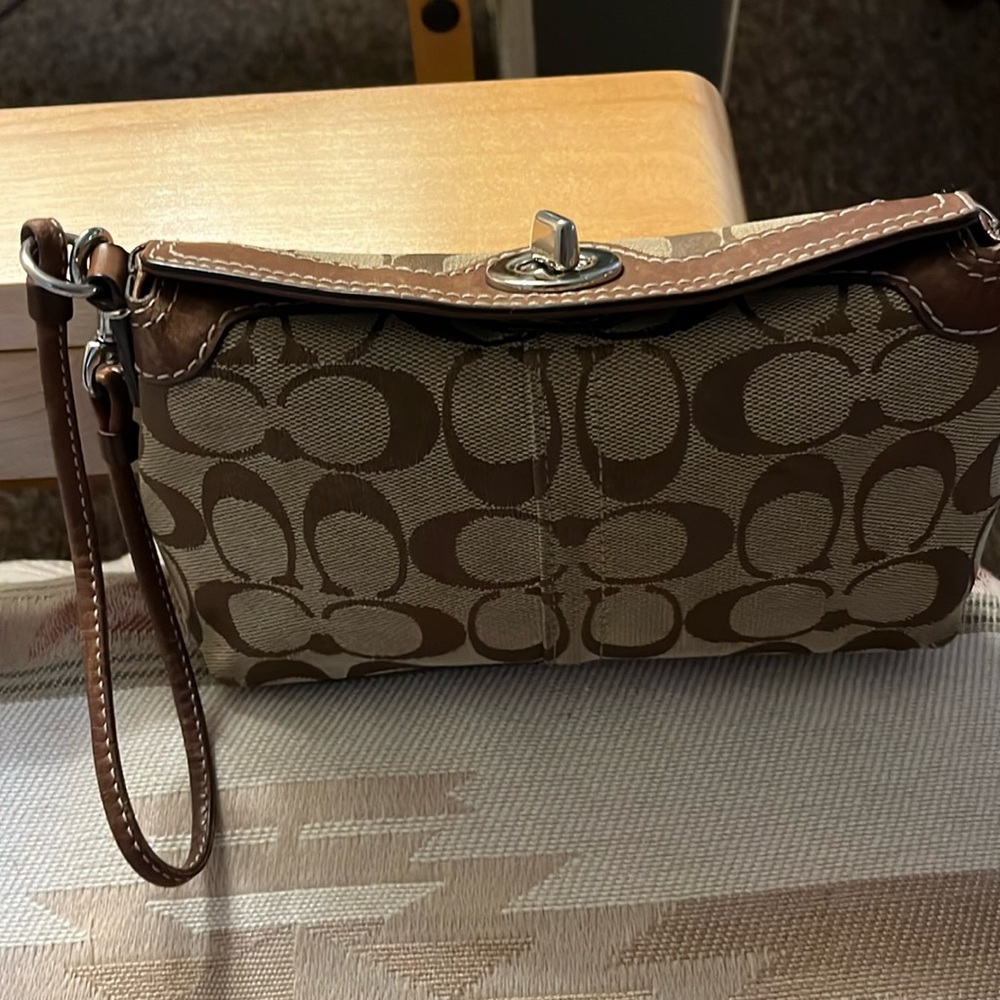 Rare top twist lock coach wristlet